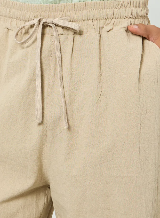 تايك تو بنطال من مزيج الكتان برباط خصر